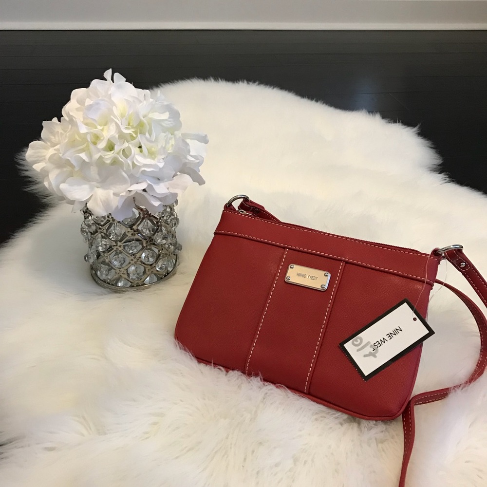 Nine West adjustable strap medium size crossbody.